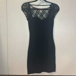 GUESS black mini dress with lace chest and open back size S
